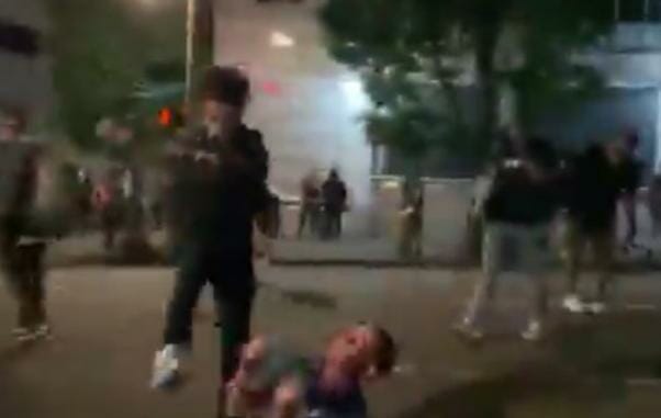 mankicksAdamHanerinthe head