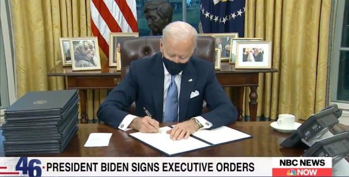 JoeinOvalOfficesigning blank papers