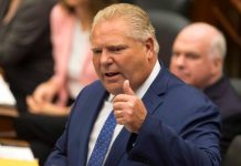 Ontario premier defends spending $2.5 million on bracelets that beep if users get too close