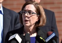 Oregon Police and Firefighters Sue Governor Over COVID-19 Vaccine Mandate